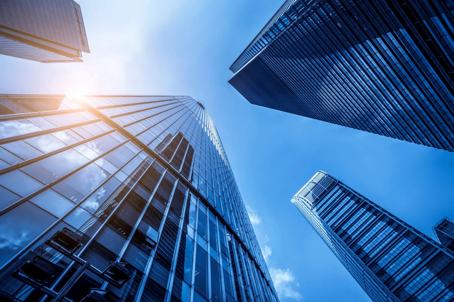 Glass office towers seen from below